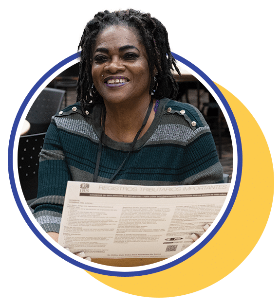 woman holding tax return forms