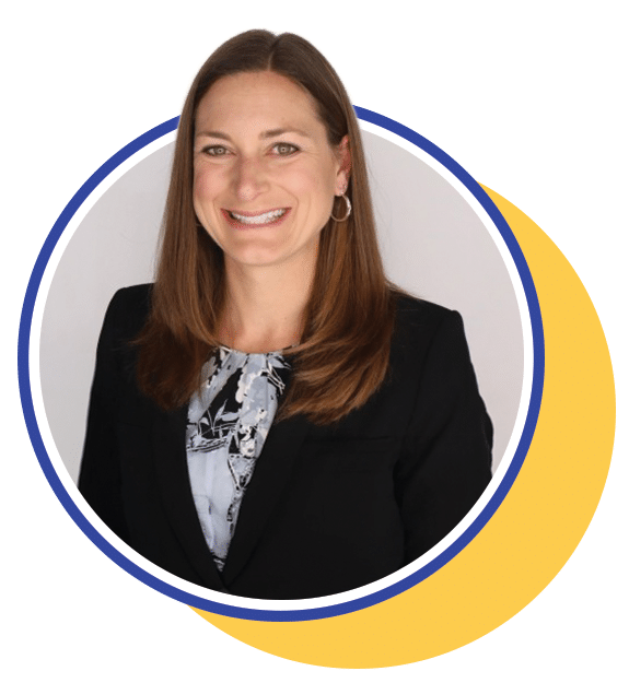 woman in a black blazer inside a circle frame smiling